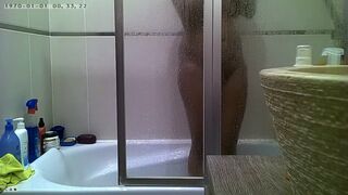 Curvy indian stepmom spied in the shower