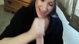 Girl jerks off her boyfriend and takes load in mouth