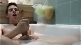 Twink jerking off in bathtub