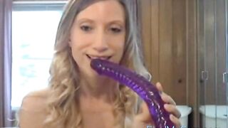 She takes a huge dildo in her ass